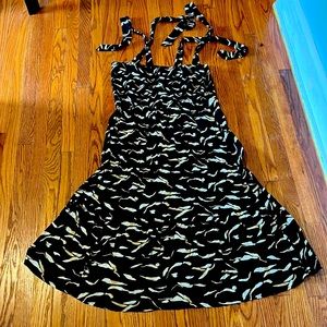 A new day sundress can be worn strapless or with attached straps. Size 2X